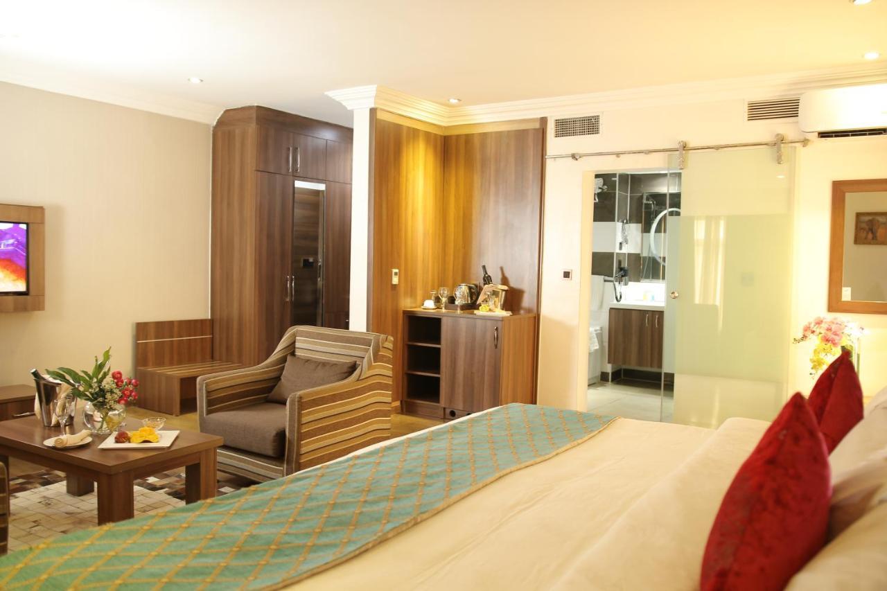 Grand Pela Hotel & Suites Abuja Bagian luar foto