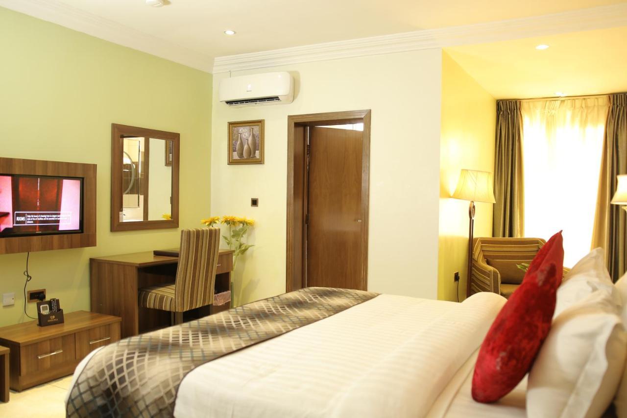 Grand Pela Hotel & Suites Abuja Bagian luar foto